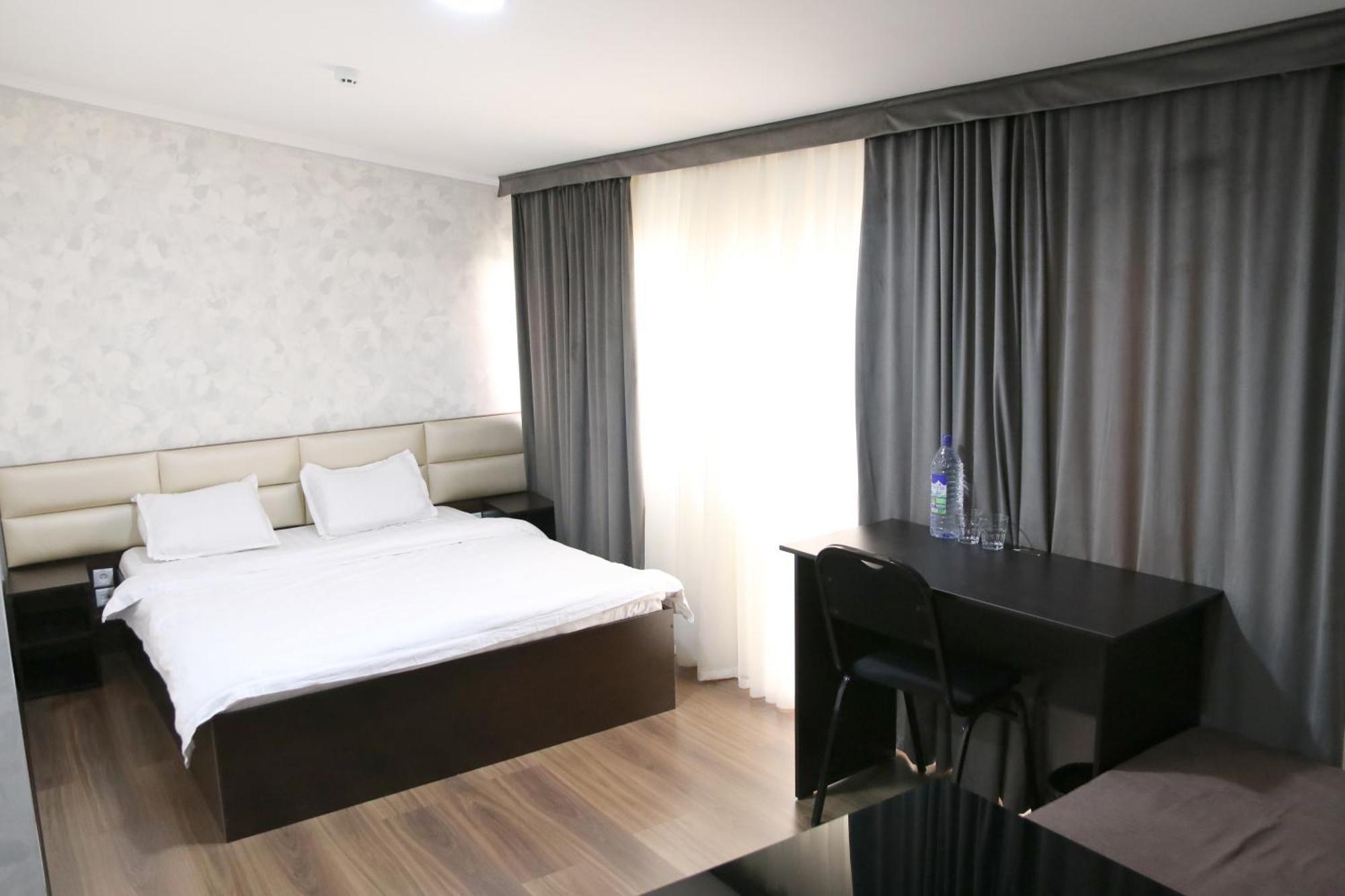 Orion Hotel Tachkent Chambre photo